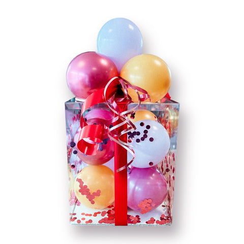 Geschenkbox mit Luftballons in mustard, chrom pomegranate, violett & pastellflieder